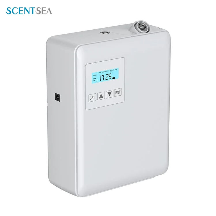 Système de distribution de parfum de toilettes commerciales